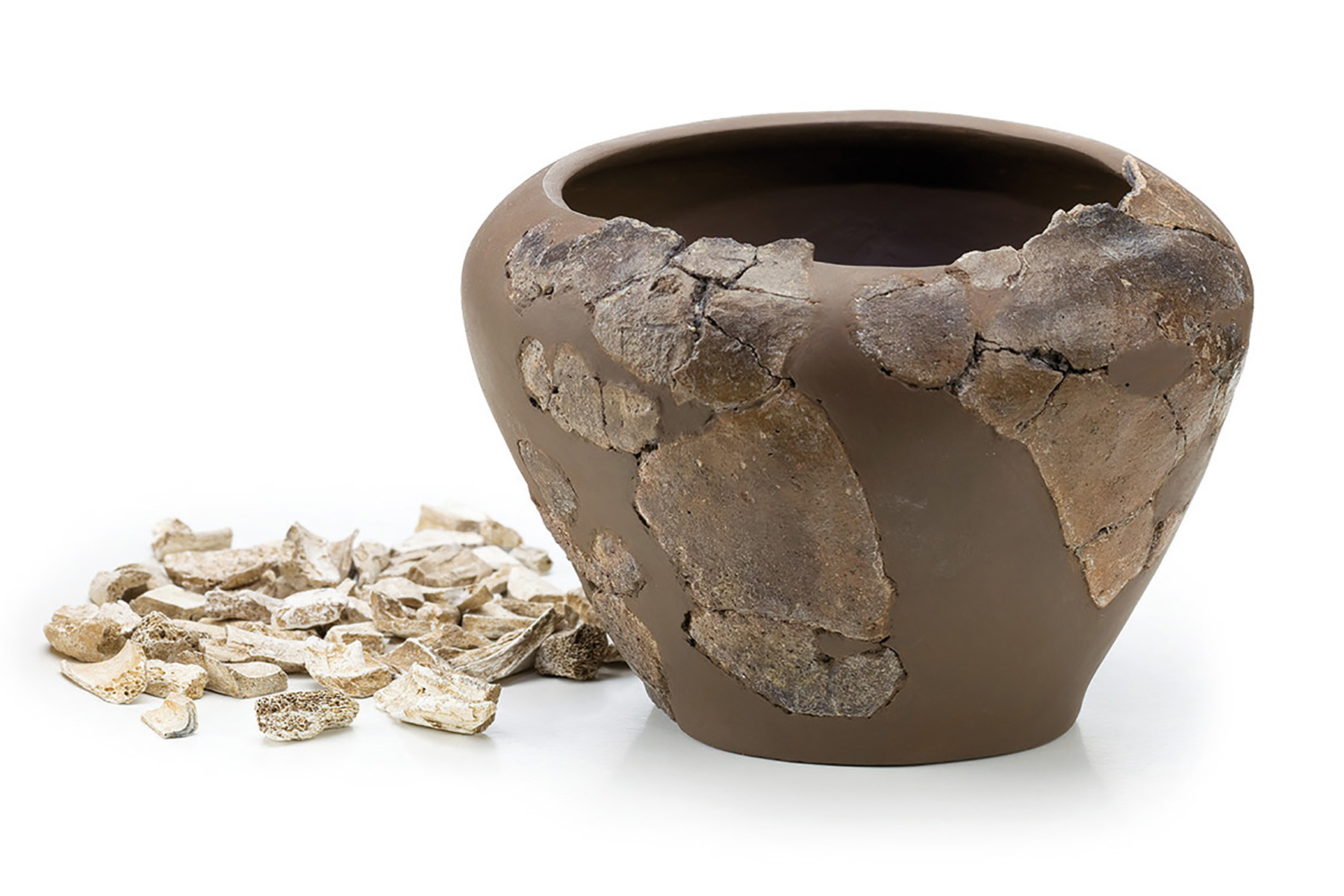 Kleiner Tontopf mit kalzinierten (verbrannten) Knochenresten, Eisenzeit 1000 – 100 v. Chr.