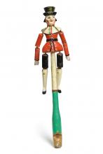 Bunter Steckengaukler, bei dem am Stockende eine Pfeife eingeschnitzt ist